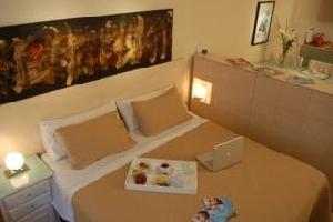 Defensa Suites by Temporary Apartments