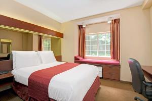 Best offers for MICROTEL INN SUITES BY WYNDHAM RALEIGH Plano 