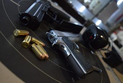 Indoor target shooting with real guns and ammo Indoor target shooting with real guns and ammo