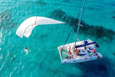 Sailing Experience to Isla Mujeres in a Catamaran with Open Bar Sailing Experience to Isla Mujeres in a Catamaran with Open Bar
