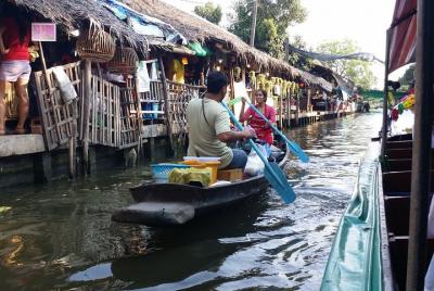 Risky market,boat riding,Ampawa floating market