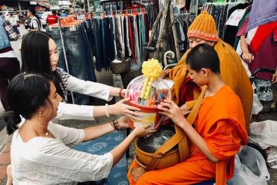 Discover the charm of Chiang Mai. Alms Giving to Monk and Temple.  Discover the charm of Chiang Mai. Alms Giving to Monk and Temple.