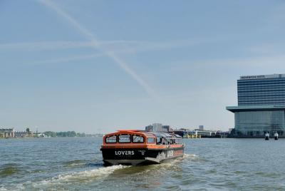 Amsterdam Sightseeing Canal Cruise by Semi-Open Boat Amsterdam Sightseeing Canal Cruise by Semi-Open Boat