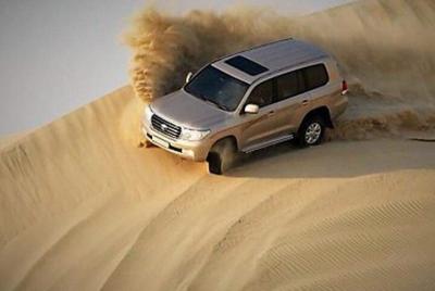 Dubai Desert Safari Red Dune: BBQ, Camel Ride & Sandboarding Dubai Desert Safari Red Dune: BBQ, Camel Ride & Sandboarding