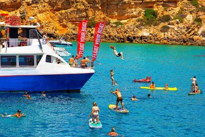 Cala Comte and Cala Bassa Beach Cruise with Paddle Surf, Snorkel  Cala Comte and Cala Bassa Beach Cruise with Paddle Surf, Snorkel