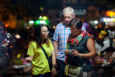 Saigon Night Street Food and City Tour on Scooter Saigon Night Street Food and City Tour on Scooter