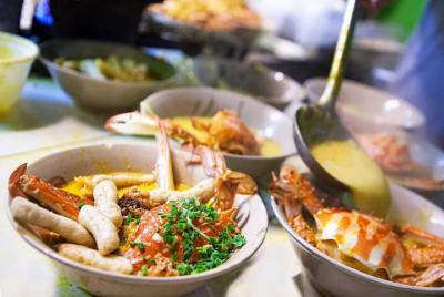 SAIGON AFTER DARK - Food tour by Vespa SAIGON AFTER DARK - Food tour by Vespa
