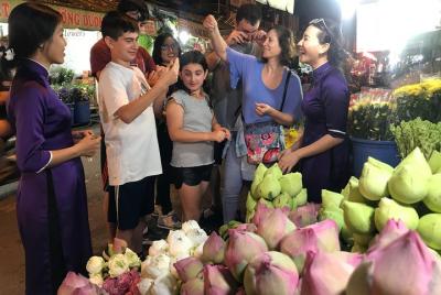 Private Walking Saigon Food Tour with Ao Dai Girl by Night Private Walking Saigon Food Tour with Ao Dai Girl by Night