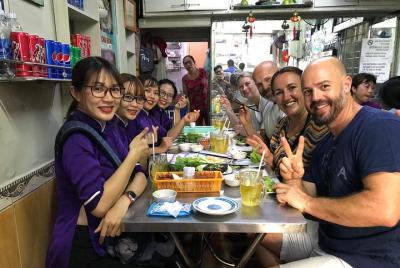Private Ho Chi Minh Street Food Tour by Motorbike with Ao Dai Female Rider Private Ho Chi Minh Street Food Tour by Motorbike with Ao Dai Female Rider