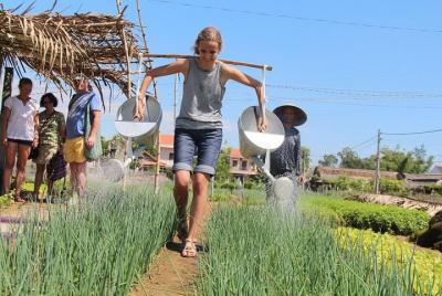 Become a Farmer at Tra Que Vegetable Village included cooking class and Foot Massage