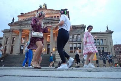 Silent disco through downtown Berlin with flash mobs Silent disco through downtown Berlin with flash mobs