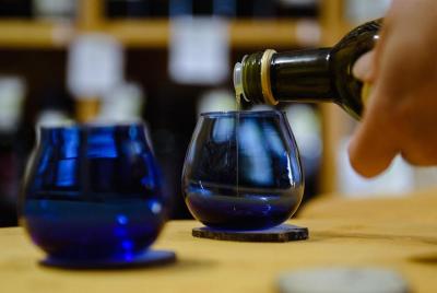 Tasting of extra virgin olive oil in the shop Tasting of extra virgin olive oil in the shop