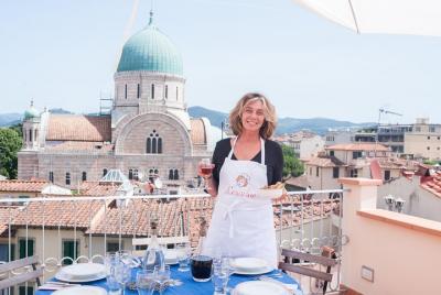 Dining experience at a local's home in Florence with show cooking