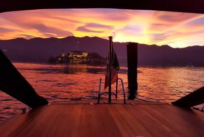 A private romantic sunset cruise on Lake Orta, sipping wine on board A private romantic sunset cruise on Lake Orta, sipping wine on board