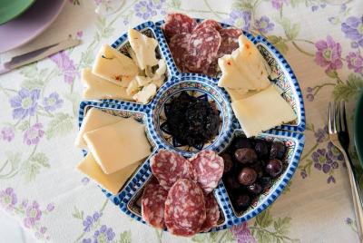 Small Group Market tour and Dining Experience at a Cesarina's home in Modena