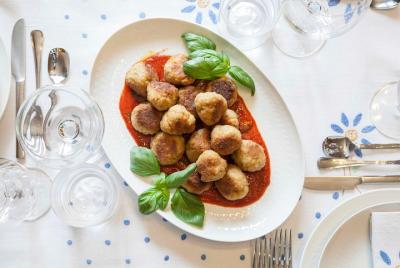 Dining experience at a local Dining experience at a local's home in Naples with show cooking