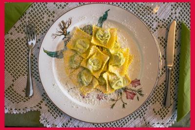Dining experience at a local Dining experience at a local's home in Parma with show cooking