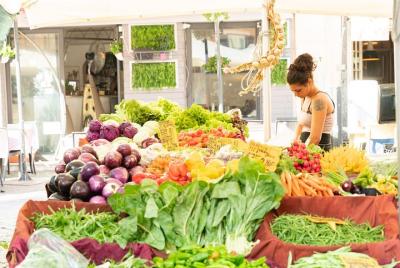 Local market visit and private cooking class at a Cesarina's home in Pisa
