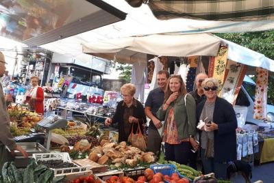 Local market visit and dining experience at a local Local market visit and dining experience at a local's home in Siena