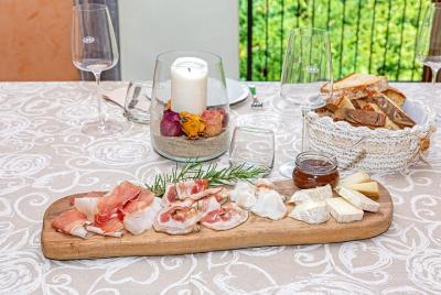 Small Group Market tour and Dining Experience at a Cesarina Small Group Market tour and Dining Experience at a Cesarina's home in Belluno