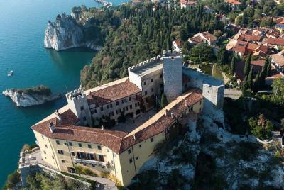 The Giant Cave and Duino Castle from Trieste The Giant Cave and Duino Castle from Trieste