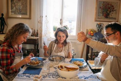 Dining experience at a local Dining experience at a local's home in Turin with show cooking
