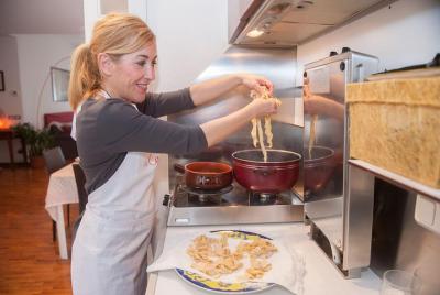 Dining experience at a local Dining experience at a local's home in Verona with show cooking