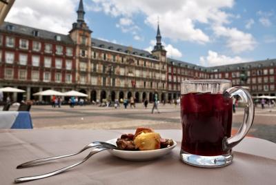 Spanish cuisine masterclass in Madrid: local market, wine tasting & tapas tour