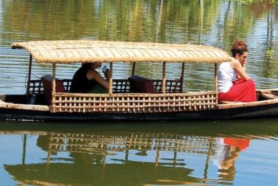 CANOEING- the taditional kerala canoe -with boatman take you through the village CANOEING- the taditional kerala canoe -with boatman take you through the village