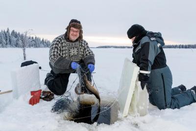 Ice Fishing by Snowmobile from Levi Ice Fishing by Snowmobile from Levi