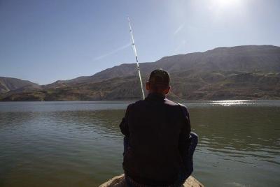 Fishing and eating grilled fresh fish from Wadi Al Mujeb Fishing and eating grilled fresh fish from Wadi Al Mujeb
