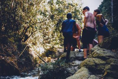 Cliff Jumping in a Tropical Waterfall Cliff Jumping in a Tropical Waterfall