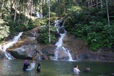 Picnic by the scenic waterfall of Kanching