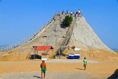 Mud volcano including pool and beach Mud volcano including pool and beach