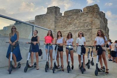 Drive around the city with Segway Ninebot electric scooter Drive around the city with Segway Ninebot electric scooter