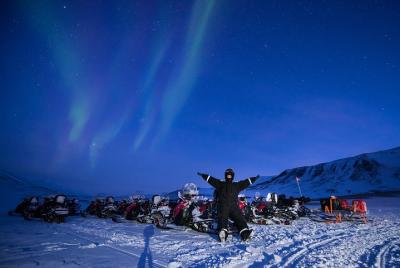 Chasing Auroras by Snowmobile Sleigh with Picnic