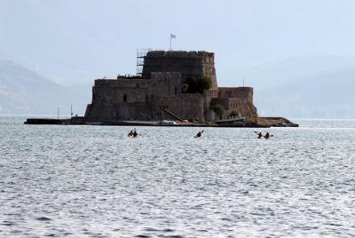 Paddle under the castles Palamidi, akropoli of Argos, Bourtzy isl Paddle under the castles Palamidi, akropoli of Argos, Bourtzy isl