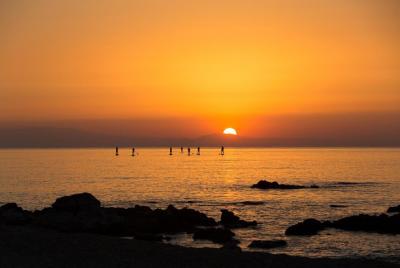 Stand-up paddling at Sunrise on Rhodes Stand-up paddling at Sunrise on Rhodes