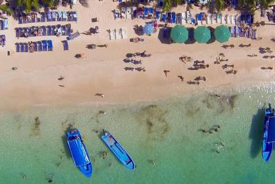 Beach Pass at a West Bay Beach Resort with Free and Optional Stop
