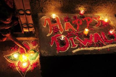 Diwali fire work and food with Indian family in a shadow of Taj Mahal Diwali fire work and food with Indian family in a shadow of Taj Mahal