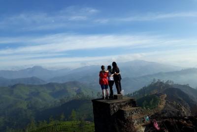 Mountain Hiking through Munnar Tea Plantation Mountain Hiking through Munnar Tea Plantation