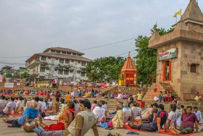 Yoga Session along the holy river Ganges in Varanasi