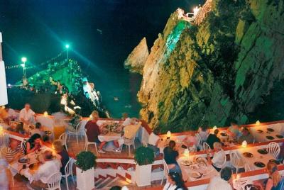 High Cliff Divers Show of La Quebrada at La Perla Restaurant ONLY High Cliff Divers Show of La Quebrada at La Perla Restaurant ONLY