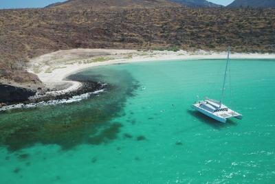 Remote Beach All-Inclusive Sailing Cruise with Snorkeling from Lo Remote Beach All-Inclusive Sailing Cruise with Snorkeling from Lo