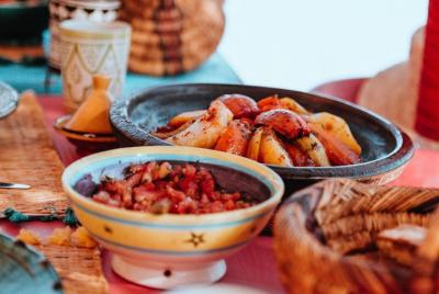 Cook a delicious Tagine, while impacting in Morocco.