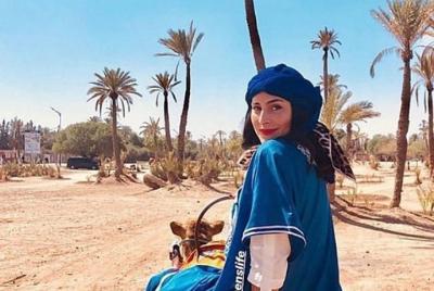 Camel ride In the village Berber Palmeraie