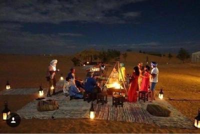 2 nights in private berber tents with camel trek, sandboarding, A