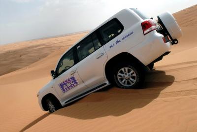 Premium Desert Safari, Barbeque, 3 Shows, Camel Ride, Sandboard a Premium Desert Safari, Barbeque, 3 Shows, Camel Ride, Sandboard a