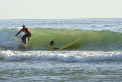 Surf lesson with Albufeira 's original surfing school - fun and e